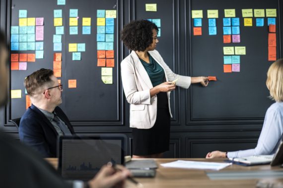 Woman brainstorming to build a message framework